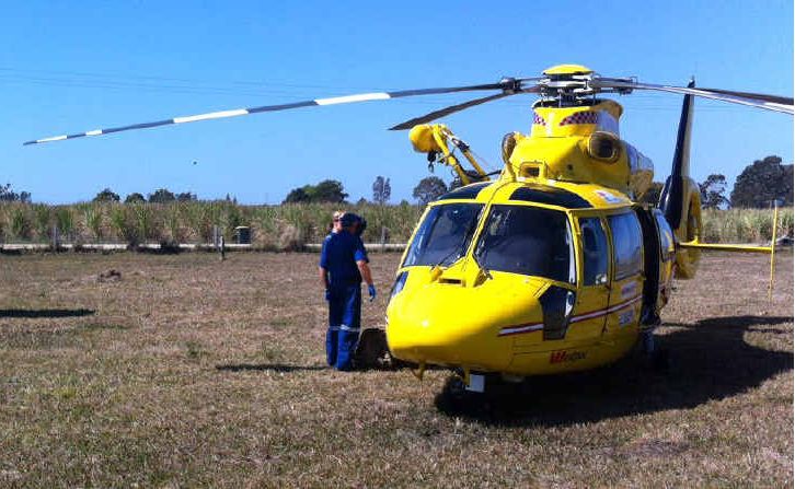 The Westpac Life Saver Rescue Helicopter at the scene where a cane farmer was critically burned at Harwood. The Westpac Life Saver Rescue Helicopter at the scene where a cane farmer was critically burned at Harwood.